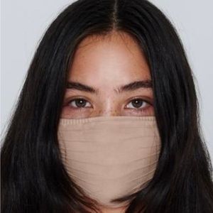 3 SKIMS beige face mask